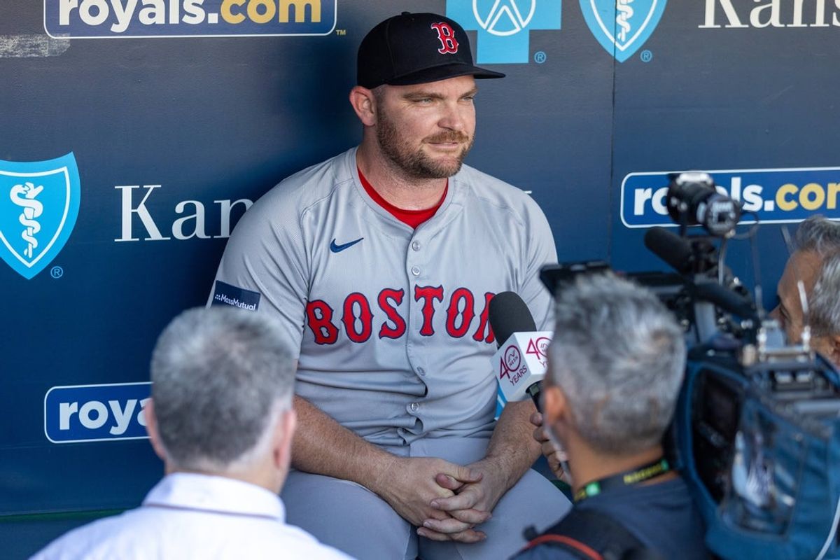 Aug 6, 2024; Kansas City, Missouri, USA; Boston Red Sox pitcher Liam Hendriks (31) is interviewed prior to the game against the Kansas City Royals at Kauffman Stadium. Mandatory Credit: William Purnell-Imagn Images