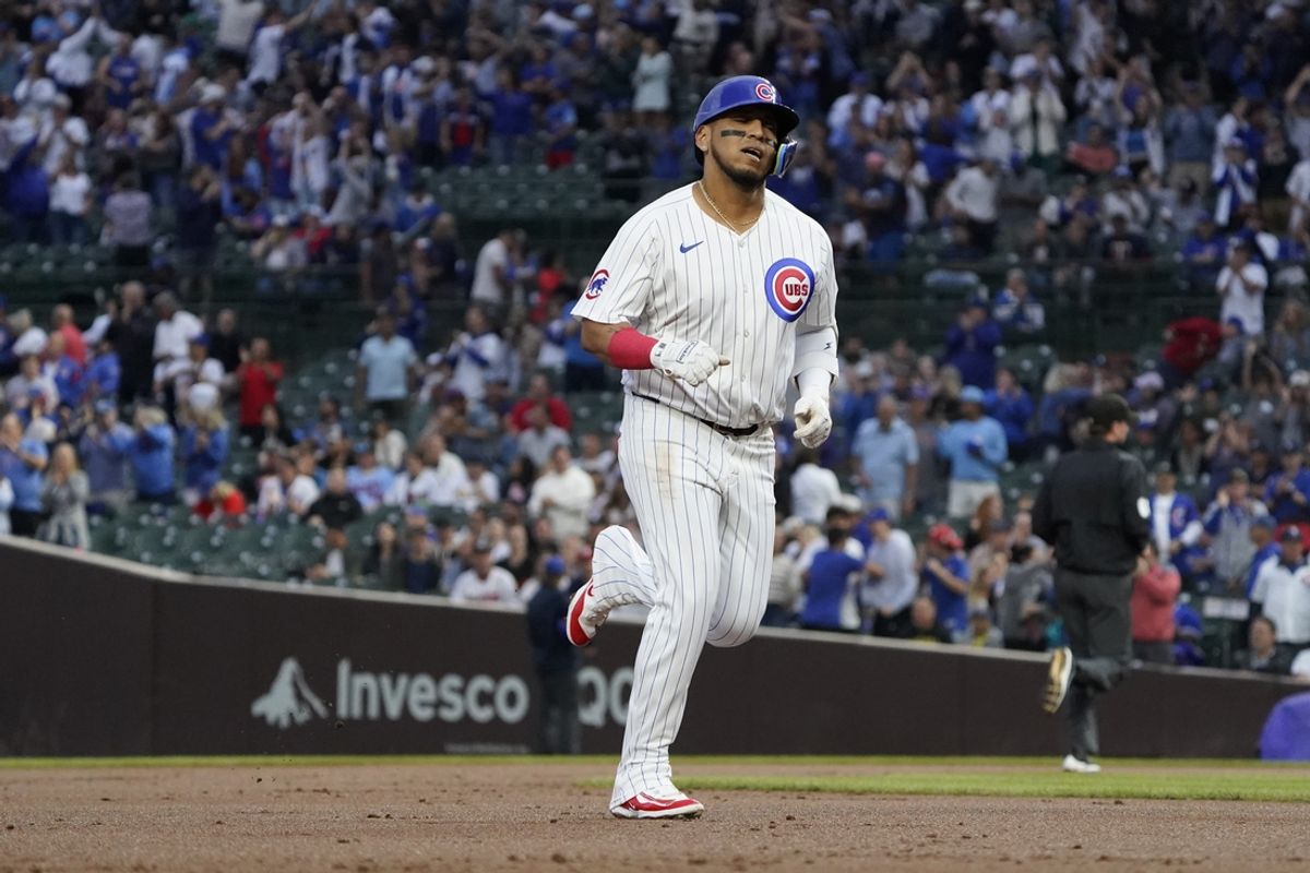 Aug 6, 2024; Chicago, Illinois, USA; Chicago Cubs third base Isaac Paredes (17) runs the bases after hitting a three-run home run against the Minnesota Twins during the first inning at Wrigley Field. Mandatory Credit: David Banks-USA TODAY Sports