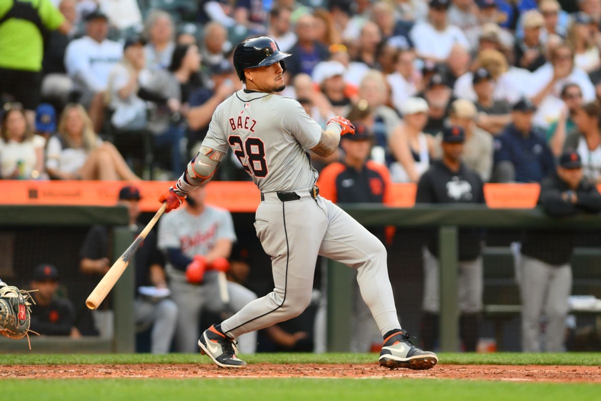 Aug 9, 2024; Seattle, Washington, USA; Detroit Tigers shortstop Javier Baez (28) hits a single against the Seattle Mariners during the fifth inning at T-Mobile Park. Mandatory Credit: Steven Bisig-USA TODAY Sports