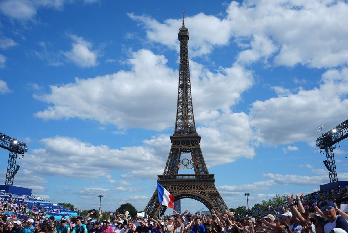 Aug 7, 2024; Paris, France; A general view as fans cheer from Trocadero under the Eiffel Tower at the medal award ceremony for the Beijing 2022 U.S. figure skating team. Mandatory Credit: Amber Searls-Imagn Images