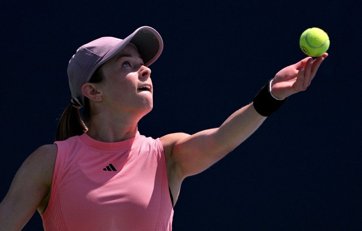 Aug 7, 2024; Toronto, Ontario, Canada;  Katie Volynets (USA) prepares to serve against Elise Mertens (BEL, not shown) in second round play at Sobeys Stadium. Mandatory Credit: Dan Hamilton-Imagn Images