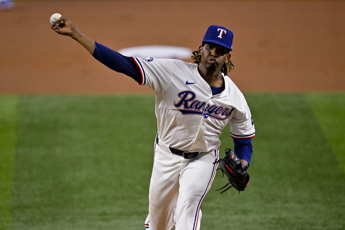 Aug 7, 2024; Arlington, Texas, USA;  Texas Rangers starting pitcher Jose Urena (54) pitches against the Houston Astros during the first inning at Globe Life Field. Mandatory Credit: Jerome Miron-Imagn Images