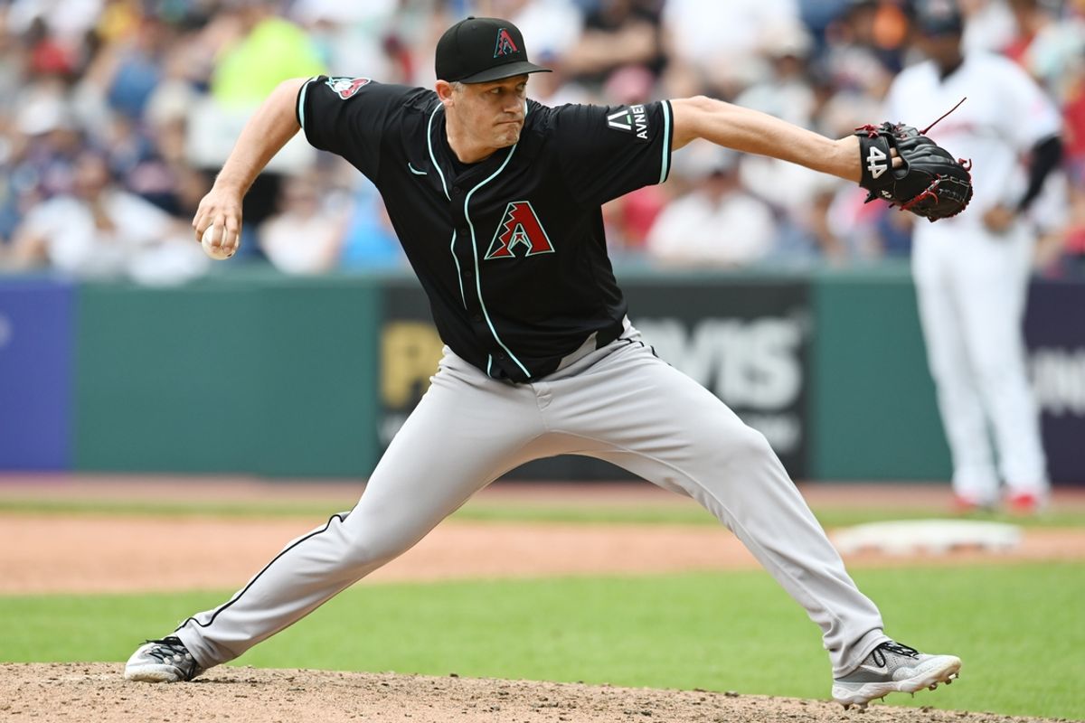 Aug 7, 2024; Cleveland, Ohio, USA; Arizona Diamondbacks relief pitcher Paul Sewald (38) throws a pitch during the ninth inning against the Cleveland Guardians at Progressive Field. Mandatory Credit: Ken Blaze-Imagn Images