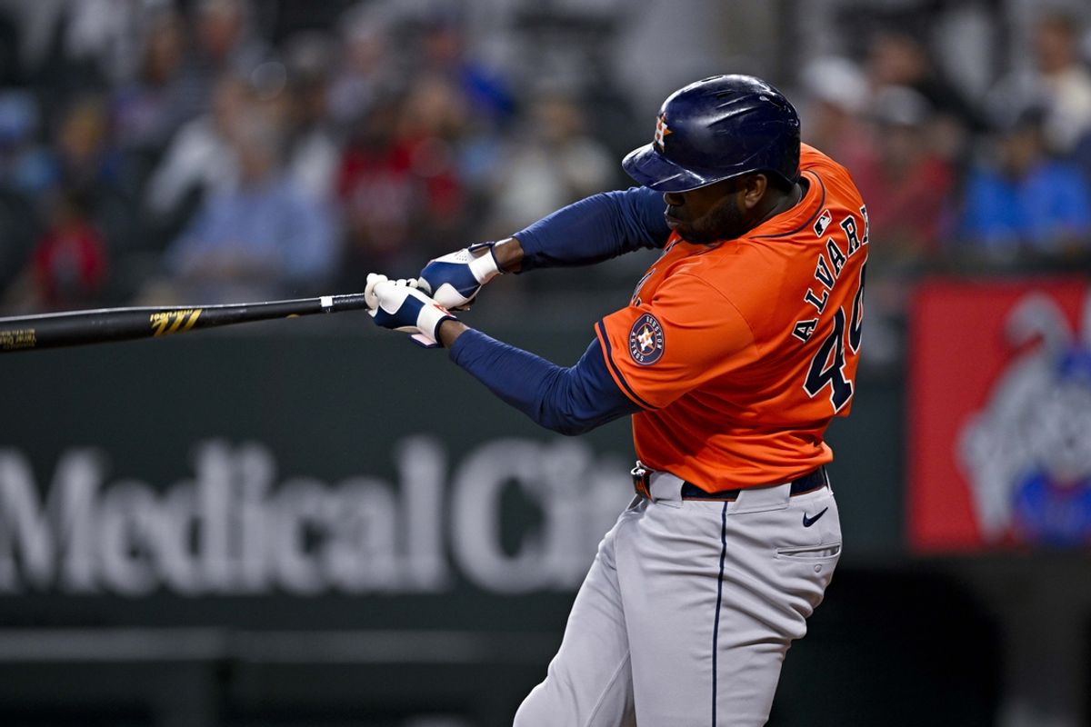 Aug 7, 2024; Arlington, Texas, USA;  Houston Astros left fielder Yordan Alvarez (44) bats against the Texas Rangers during the fifth inning at Globe Life Field. Mandatory Credit: Jerome Miron-USA TODAY Sports