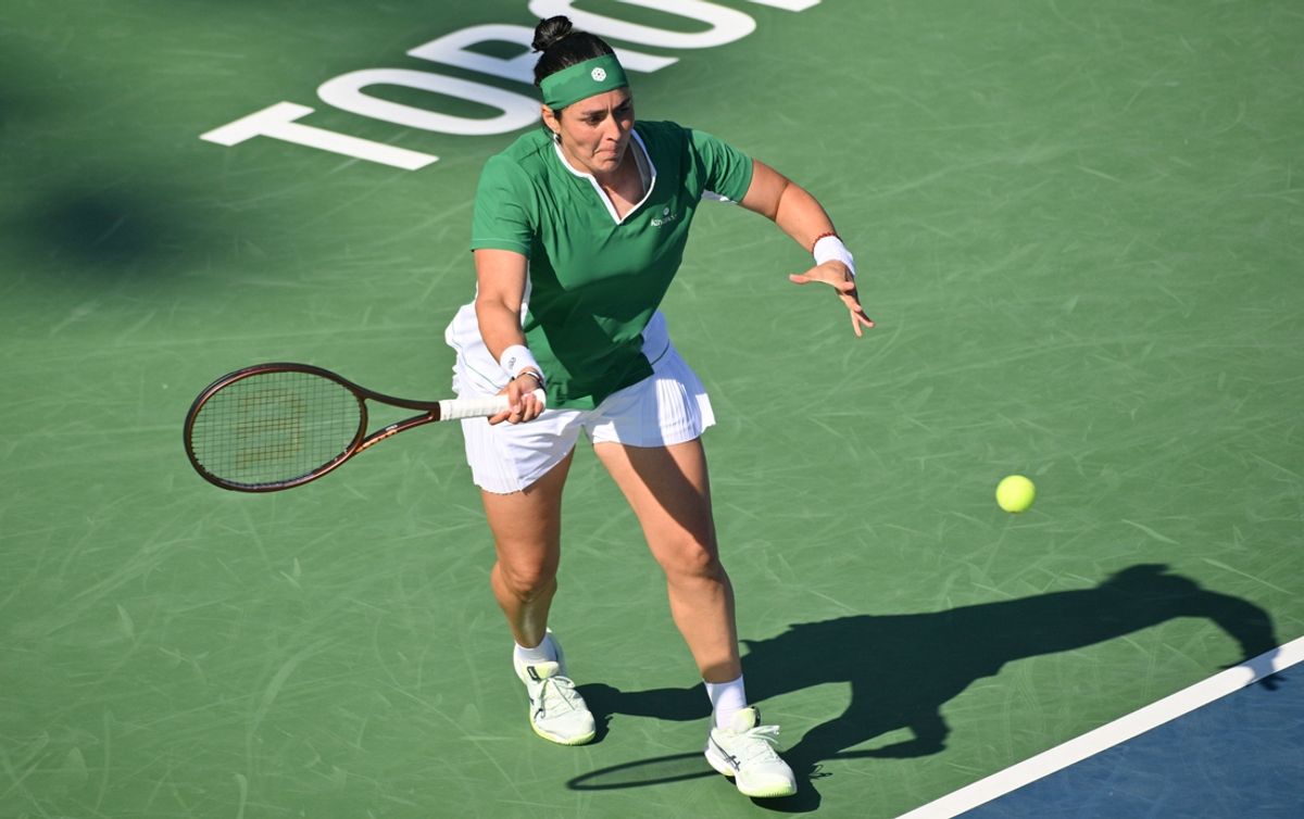 Aug 7, 2024; Toronto, Ontario, Canada;   Ons Jabeur (TUN) plays a shot against Naomi Osaka (JPN, not shown) in second round play at Sobeys Stadium. Mandatory Credit: Dan Hamilton-USA TODAY Sports