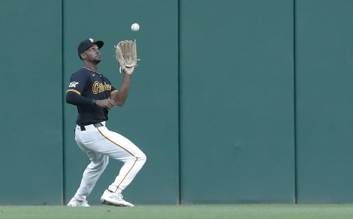 Aug 7, 2024; Pittsburgh, Pennsylvania, USA;  Pittsburgh Pirates center fielder Michael A. Taylor (18) makes a catch for an out on a ball hit by San Diego Padres designated hitter Luis Arraez (not pictured) during the fourth inning at PNC Park. Mandatory Credit: Charles LeClaire-Imagn Images