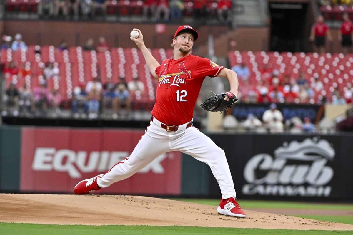 Aug 7, 2024; St. Louis, Missouri, USA;  St. Louis Cardinals starting pitcher Erick Fedde (12) pitches against the Tampa Bay Rays during the first inning at Busch Stadium. Mandatory Credit: Jeff Curry-USA TODAY Sports