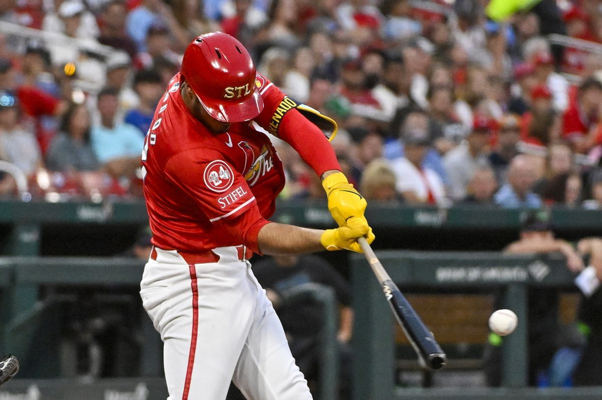 Aug 7, 2024; St. Louis, Missouri, USA;  St. Louis Cardinals third baseman Nolan Arenado (28) hits a two run single against the Tampa Bay Rays during the third inning at Busch Stadium. Mandatory Credit: Jeff Curry-USA TODAY Sports