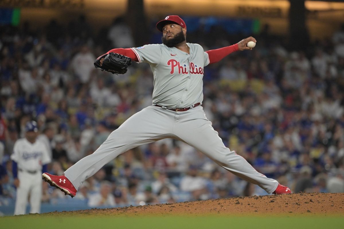 Aug 7, 2024; Los Angeles, California, USA;   Philadelphia Phillies relief pitcher Jose Alvarado (46) delivers to the plate in the seventh inning against the Los Angeles Dodgers at Dodger Stadium. Mandatory Credit: Jayne Kamin-Oncea-USA TODAY Sports