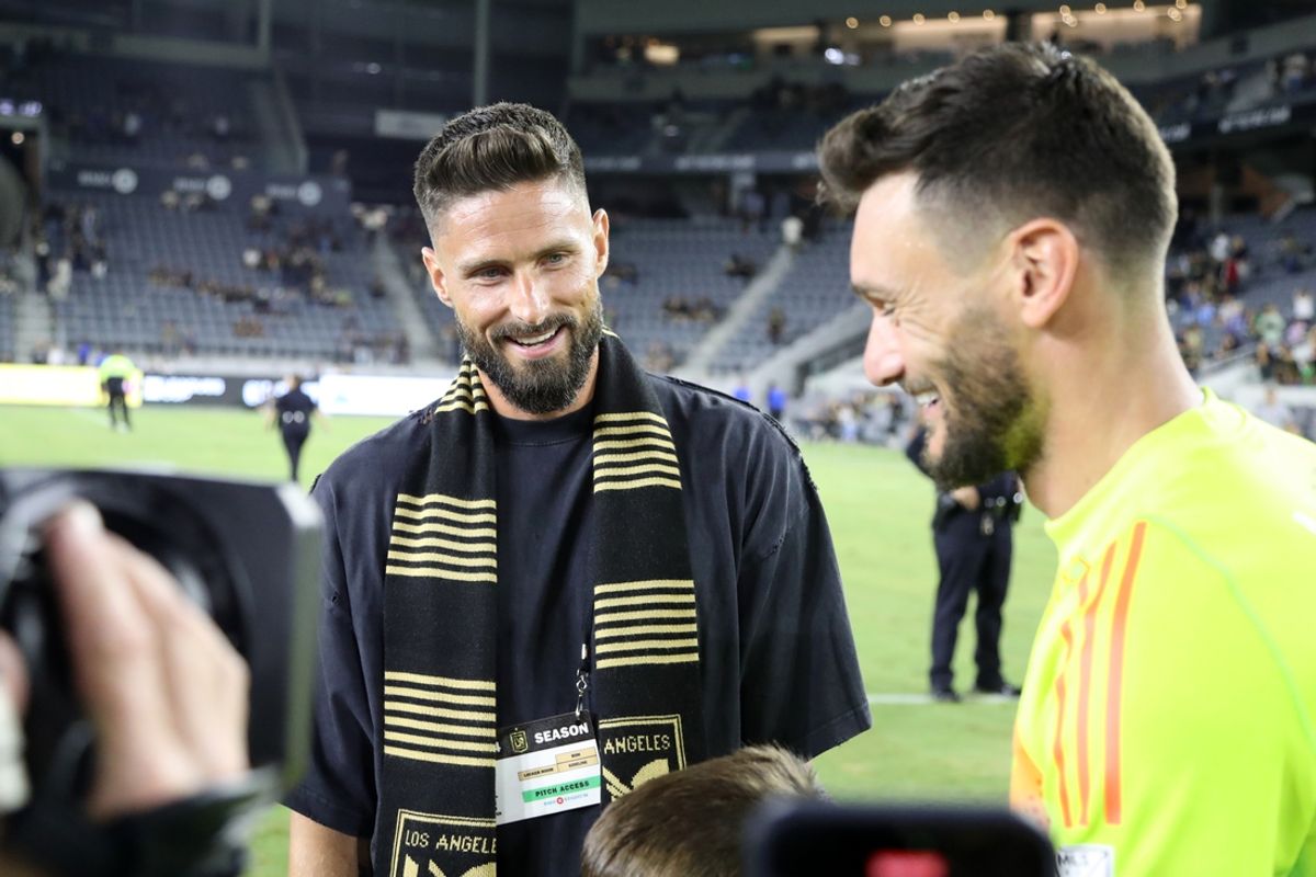 Aug 7, 2024; Los Angeles, California, USA;  Olivier Giroud (left) talks with LAFC goalkeeper Hugo Lloris (1) after the game against the Austin FC at BMO Stadium. Mandatory Credit: Kiyoshi Mio-Imagn Images