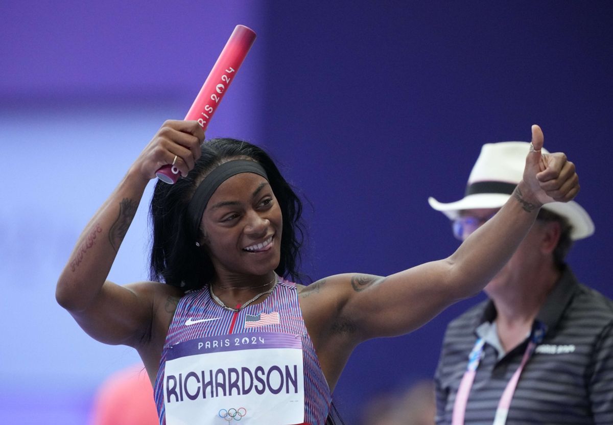 Aug 8, 2024; Saint-Denis, FRANCE; Sha'carri Richardson (USA) reacts in the women's 4x100m relay round 1 heats during the Paris 2024 Olympic Summer Games at Stade de France. Mandatory Credit: James Lang-USA TODAY Sports
