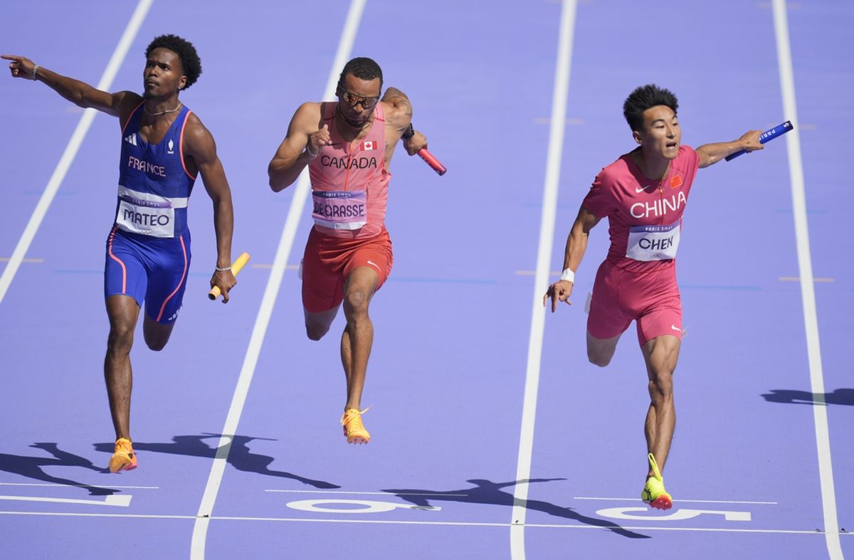 Aug 8, 2024; Saint-Denis, FRANCE; Andre de Grasse (CAN) races Jiapeng Chen (CHN) and Pablo Mateo (FRA) in the men's 4x100m relay round 1 heats during the Paris 2024 Olympic Summer Games at Stade de France. Mandatory Credit: Andrew Nelles-USA TODAY Sports