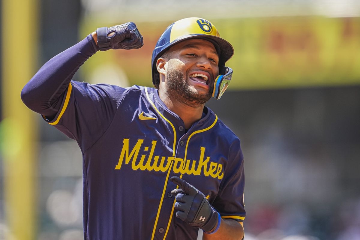 Aug 8, 2024; Cumberland, Georgia, USA; Milwaukee Brewers left fielder Jackson Chourio (11) reacts after hitting a home run against the Atlanta Braves during the second inning at Truist Park. Mandatory Credit: Dale Zanine-USA TODAY Sports
