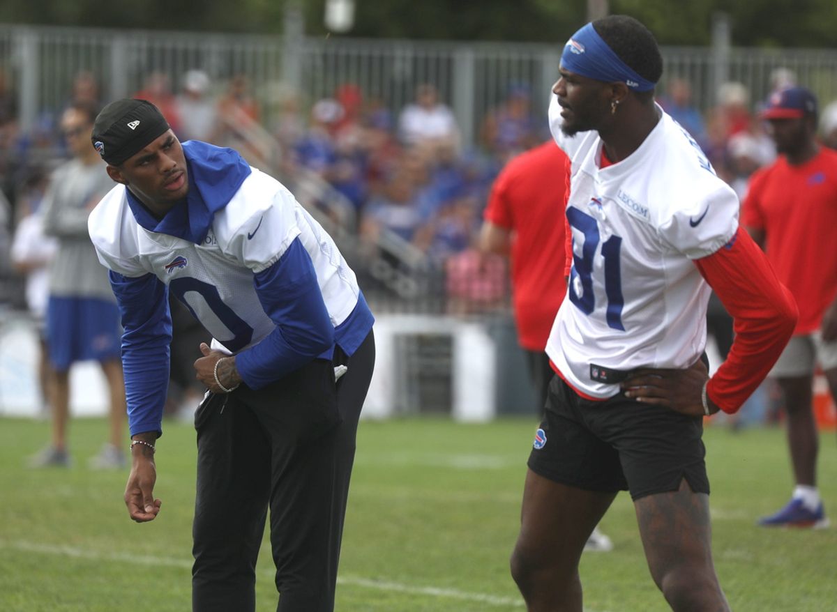Bills Keon Coleman and Marquez Valdes-Scantling chat while stretching at Bills training camp at St. John Fisher University in Pittsford, NY on August 8, 2024.