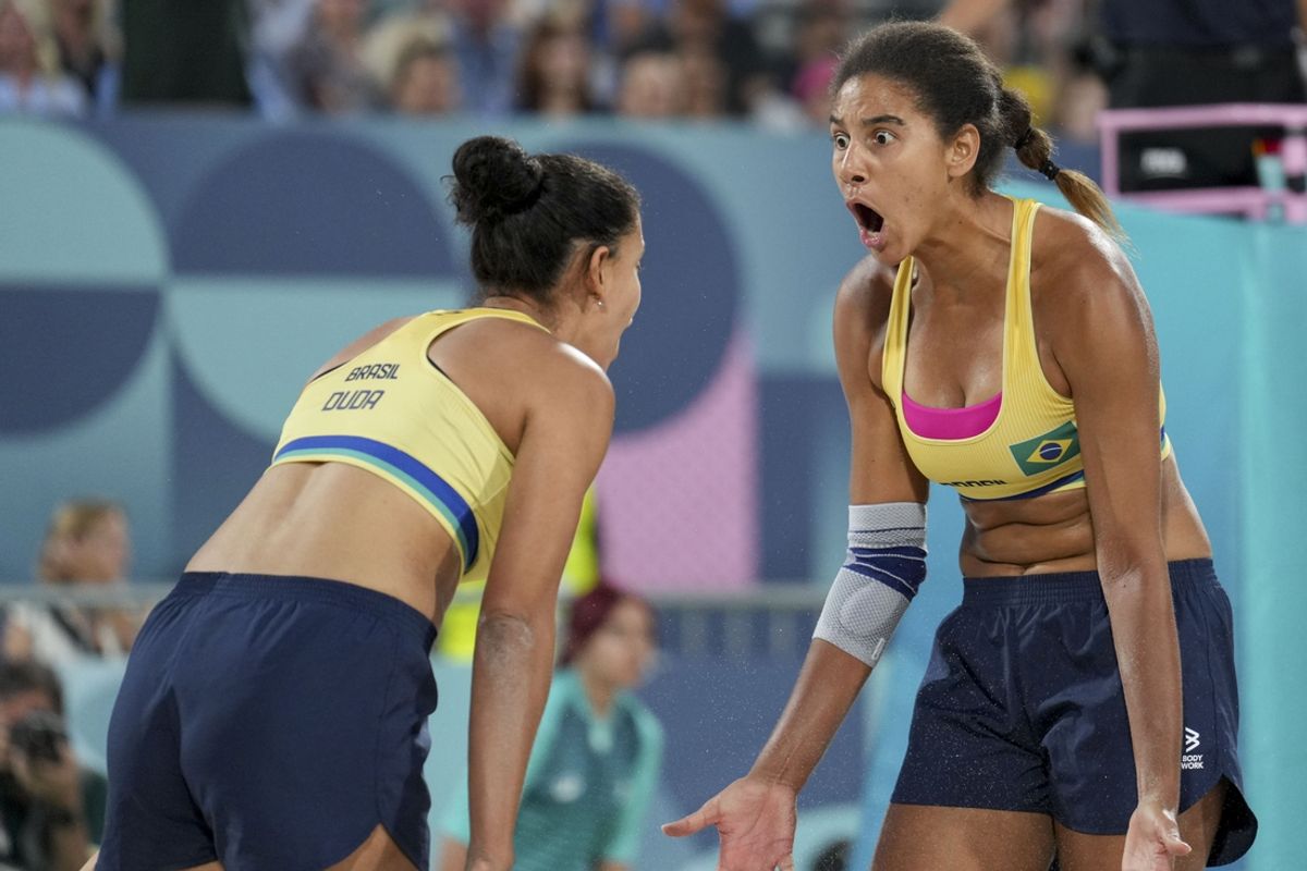Aug 8, 2024; Paris, France; Brazil’s Eduarda Santos Lisboa (2) and Brazil’s Ana Patricia Silva Ramos (1) during the Paris 2024 Olympic Summer Games at Eiffel Tower Stadium. Mandatory Credit: Grace Hollars-USA TODAY Sports