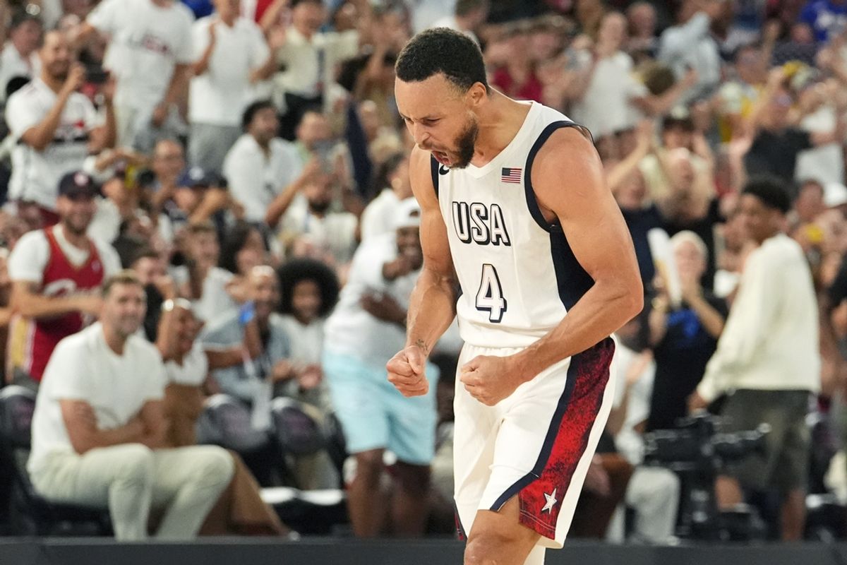 Aug 8, 2024; Paris, France; United States shooting guard Stephen Curry (4) celebrates during the second half against Serbia in a men's basketball semifinal game during the Paris 2024 Olympic Summer Games at Accor Arena. Mandatory Credit: Rob Schumacher-USA TODAY Sports