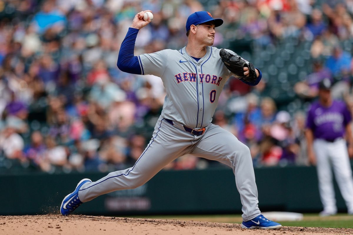 Aug 8, 2024; Denver, Colorado, USA; New York Mets relief pitcher Adam Ottavino (0) pitches in the sixth inning against the Colorado Rockies at Coors Field. Mandatory Credit: Isaiah J. Downing-Imagn Images