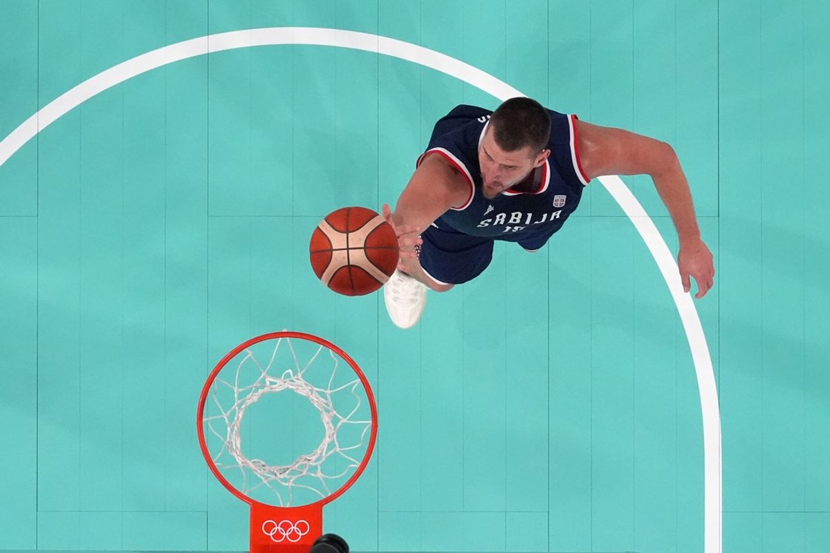 Aug 8, 2024; Paris, France; Serbia power forward Nikola Jokic (15) goes to the basket against the United States in a men's basketball semifinal game during the Paris 2024 Olympic Summer Games at Accor Arena. Mandatory Credit: Kyle Terada-USA TODAY Sports