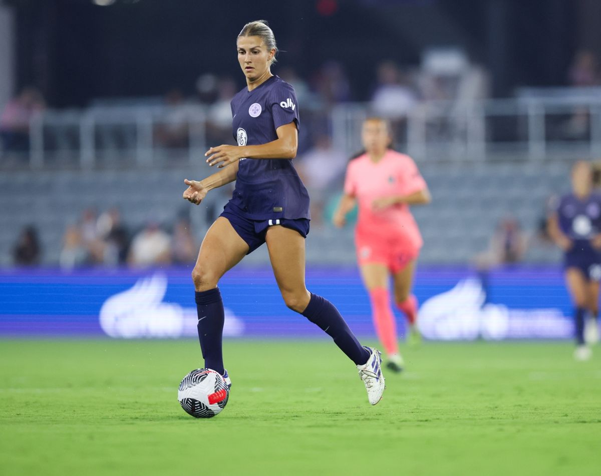 Jul 26, 2024; Louisville, KY, USA;  Racing Louisville FC midfielder Kayla Fischer (9) dribbles the ball during the second half against North Carolina Courage at Lynn Family Stadium. Mandatory Credit: EM Dash-USA TODAY Sports