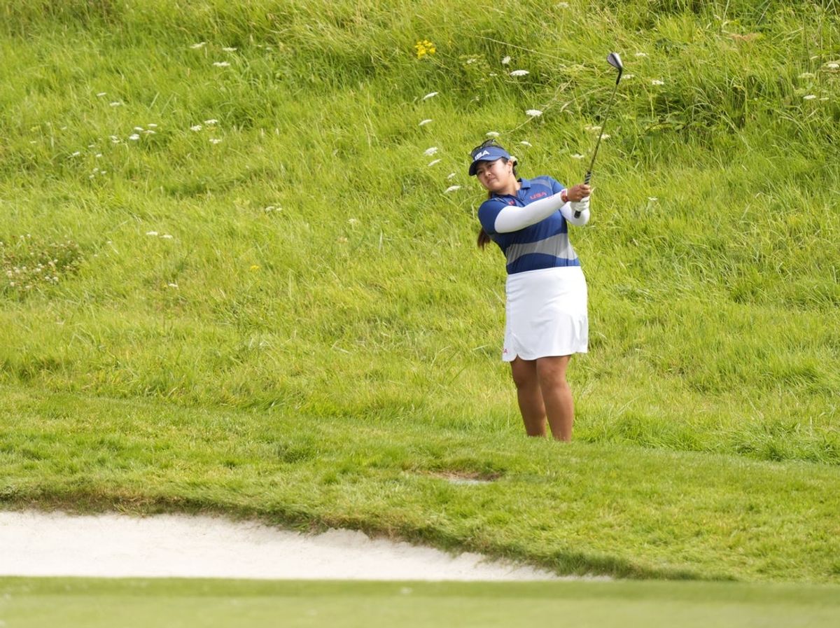Aug 9, 2024; Saint-Quentin-en-Yvelines, France; Lilia Vu (US) chips onto the 14th green in the third round of women's individual stroke play during the Paris 2024 Olympic Summer Games at Le Golf National. Mandatory Credit: Katie Goodale-Imagn Images