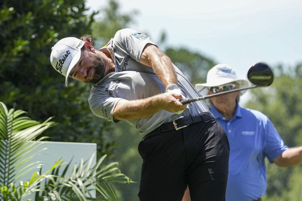 Aug 9, 2024; Greensboro, North Carolina, USA; Cameron Young hits his tee shot on the 15th hole during the first round of the Wyndham Championship golf tournament at Sedgefield Country Club. Mandatory Credit: Jim Dedmon-Imagn Images