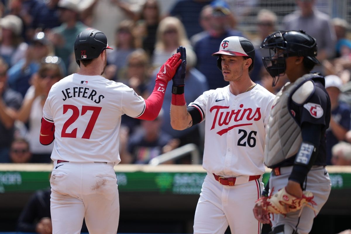 Aug 9, 2024; Minneapolis, Minnesota, USA; Minnesota Twins catcher Ryan Jeffers (27) celebrates with right fielder Max Kepler (26) after hitting a solo home run against the Cleveland Guardians during the fourth inning at Target Field. Mandatory Credit: Jordan Johnson-USA TODAY Sports