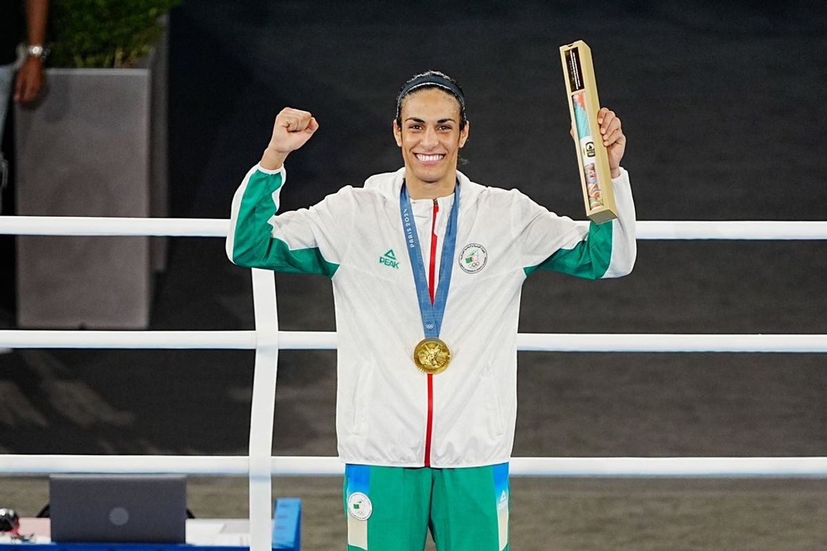 Aug 9, 2024; Paris, France; Imane Khelif (ALG) celebrates her gold medal in a women’s 66kg victory ceremony during the Paris 2024 Olympic Summer Games at Stade Roland Garros. Mandatory Credit: Andrew P. Scott-Imagn Images