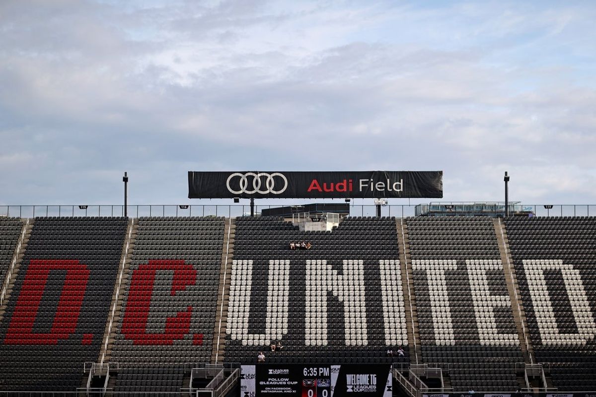 Aug 9, 2024; Washington, District of Columbia, USA; Fans sit above the DC United logo in the stands before the game between the D.C. United and the Mazatlan in the Leagues Cup Round of 32 at Audi Field. Mandatory Credit: Peter Casey-Imagn Images