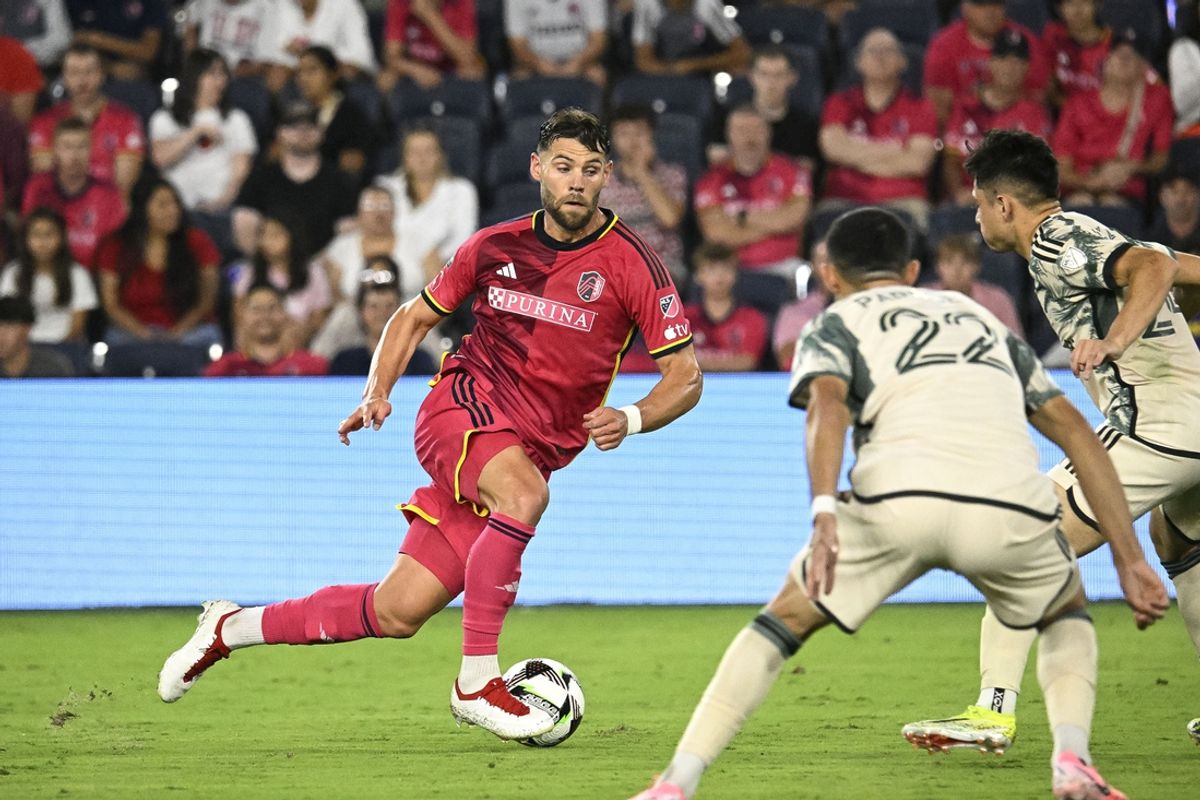Aug 9, 2024; St. Louis, Missouri, USA; St. Louis CITY SC midfielder Eduard Loewen (10) in action against the Portland Timbers at CITYPARK. Mandatory Credit: Scott Rovak-USA TODAY Sports