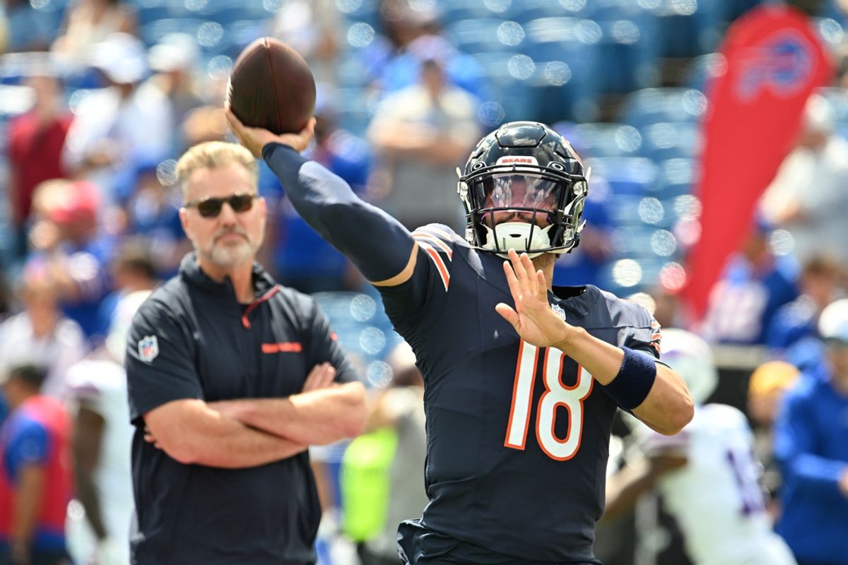 Chicago Bears quarterback Caleb Williams (18) throws a pass in warm ups with head coach Matt Eberflus looking on before a preseason game against the Buffalo Bills at Highmark Stadium. Mandatory Credit: Mark Konezny-Imagn Images