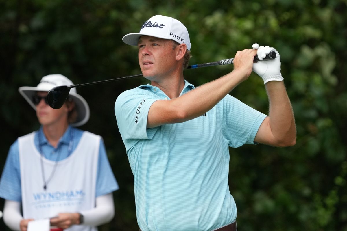 Aug 10, 2024; Greensboro, North Carolina, USA; Patton Kizzire hits his tee shot from two during the second round of the Wyndham Championship golf tournament at Sedgefield Country Club. Mandatory Credit: Jim Dedmon-Imagn Images