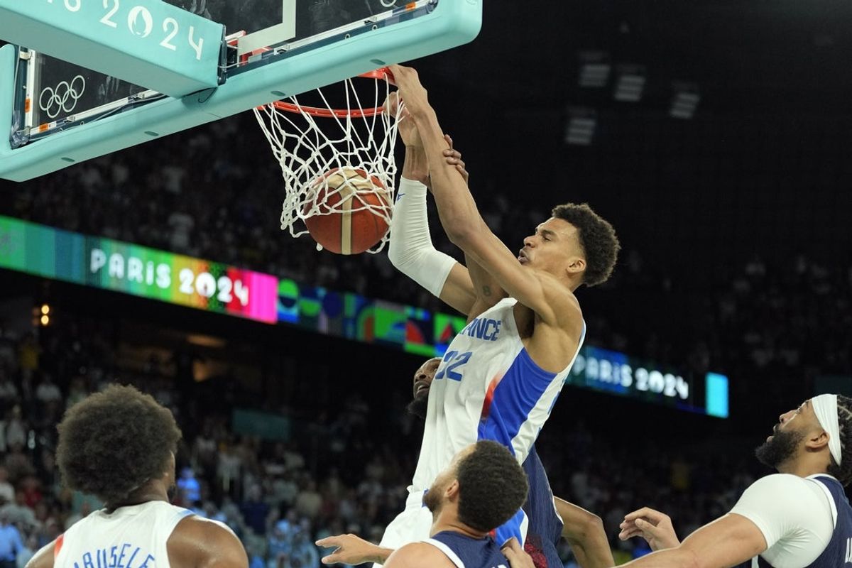 Aug 10, 2024; Paris, France; France power forward Victor Wembanyama (32) shoots against the United States in the second half in the men's basketball gold medal game during the Paris 2024 Olympic Summer Games at Accor Arena. Mandatory Credit: Kyle Terada-Imagn Images