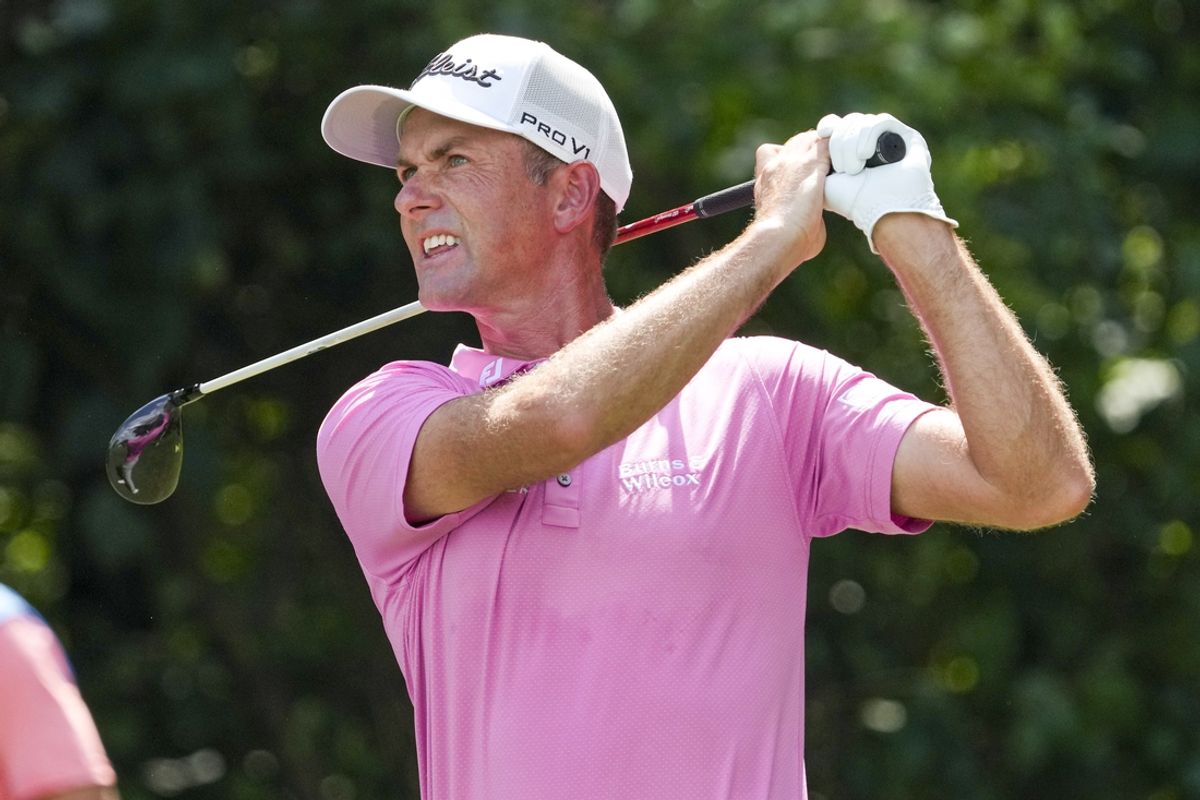 Aug 10, 2024; Greensboro, North Carolina, USA; Webb Simpson hits his tee shot on two during the second round of the Wyndham Championship golf tournament at Sedgefield Country Club. Mandatory Credit: Jim Dedmon-Imagn Images