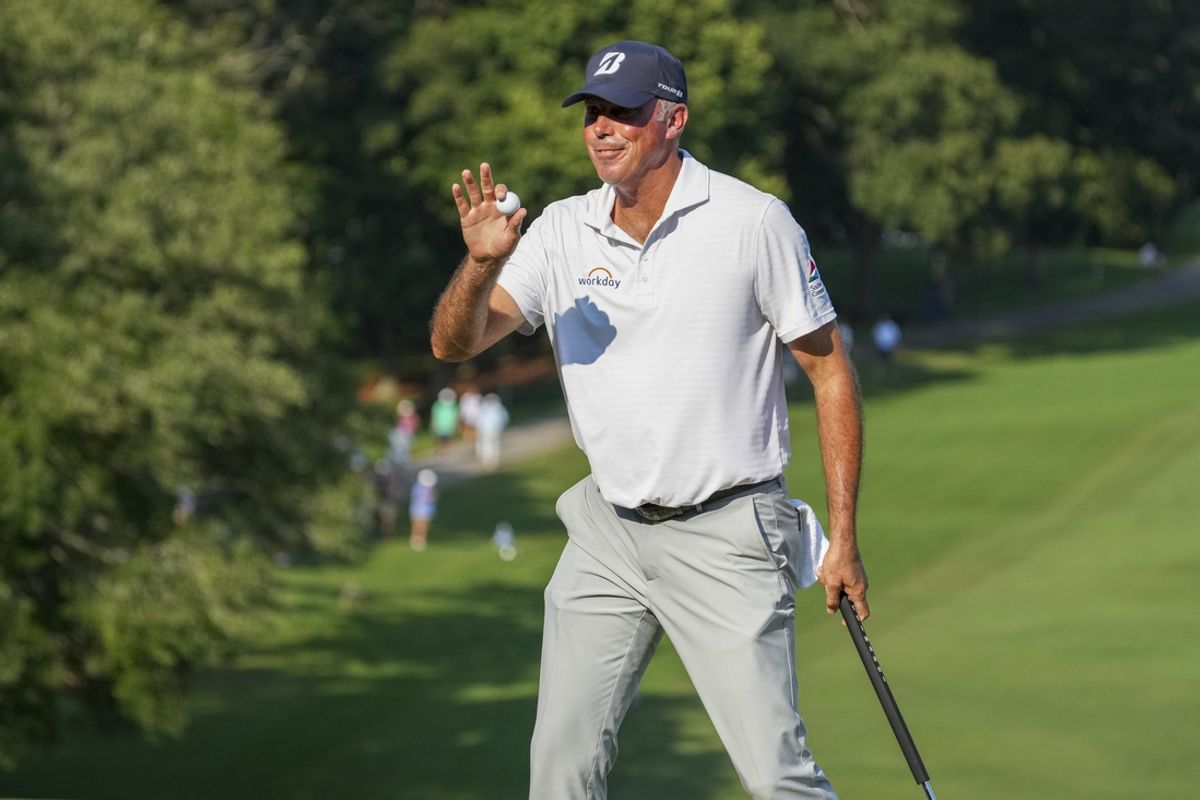 Aug 10, 2024; Greensboro, North Carolina, USA; Matt Kuchar acknowledges the gallery on 18 during the second round of the Wyndham Championship golf tournament at Sedgefield Country Club. Mandatory Credit: Jim Dedmon-USA TODAY Sports