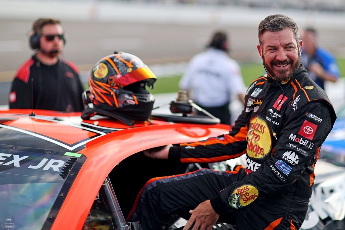 Aug 10, 2024; Richmond, Virginia, USA; NASCAR Cup Series driver Martin Truex Jr. (19) during practice and qualifying for the Cook Out 400 at Richmond Raceway. Mandatory Credit: Peter Casey-Imagn Images