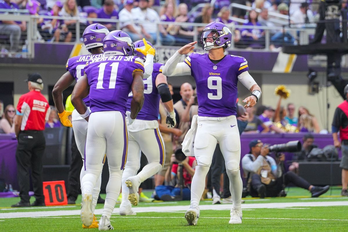 Aug 10, 2024; Minneapolis, Minnesota, USA; Minnesota Vikings quarterback J.J. McCarthy (9) celebrates wide receiver Trent Sherfield Sr. (11) touchdown against the Las Vegas Raiders in the third quarter at U.S. Bank Stadium. Mandatory Credit: Brad Rempel-Imagn Images