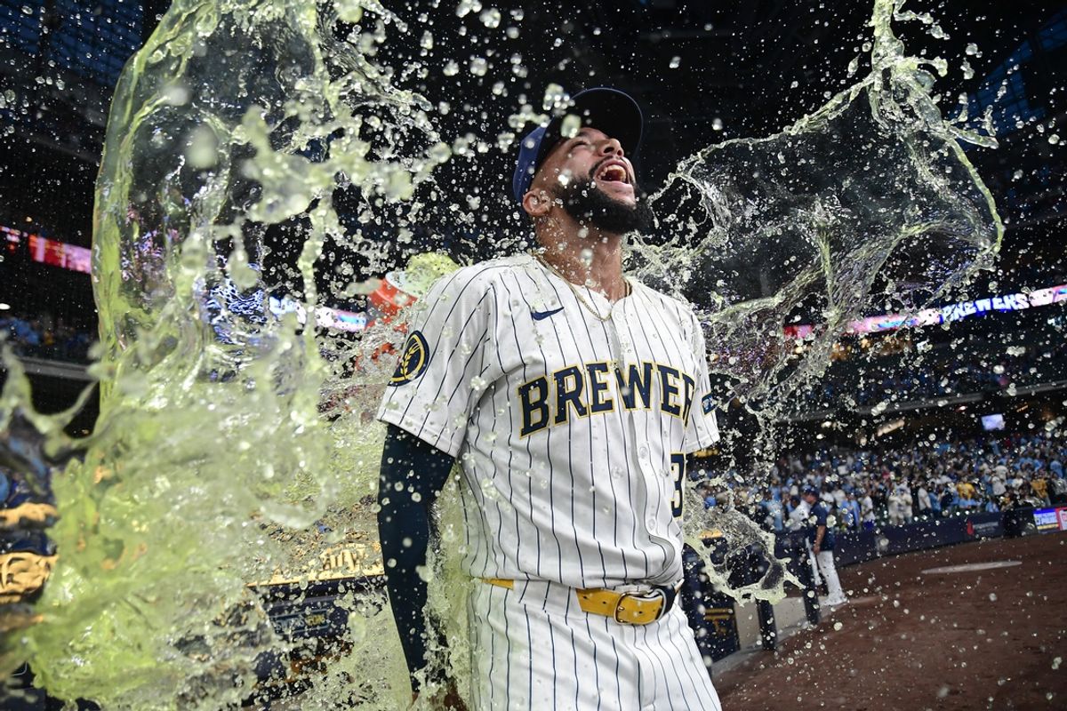 Aug 10, 2024; Milwaukee, Wisconsin, USA;  Milwaukee Brewers pitcher Devin Williams (38) celebrates after picking up a save against the Cincinnati Reds at American Family Field. Mandatory Credit: Benny Sieu-USA TODAY Sports