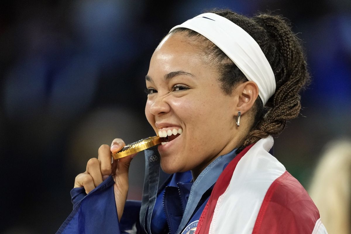 Aug 11, 2024; Paris, France; United States small forward Napheesa Collier (11) celebrates on the podium after defeating France in the women's gold medal game during the Paris 2024 Olympic Summer Games at Accor Arena. Mandatory Credit: Kyle Terada-USA TODAY Sports