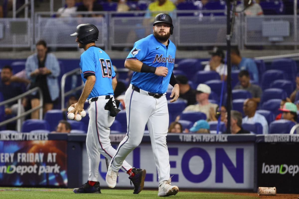 Aug 11, 2024; Miami, Florida, USA; Miami Marlins third baseman Jake Burger (36) looks on after scoring against the San Diego Padres during the first inning at loanDepot Park. Mandatory Credit: Sam Navarro-USA TODAY Sports
