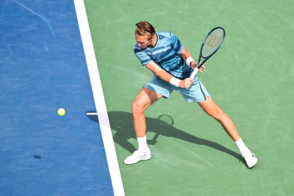 Aug 11, 2024; Montreal, Quebec, Canada; Sebastian Korda (USA) returns the ball to Alexander Zverev (GER) (not pictured) in quarterfinal play at IGA Stadium. Mandatory Credit: David Kirouac-USA TODAY Sports
