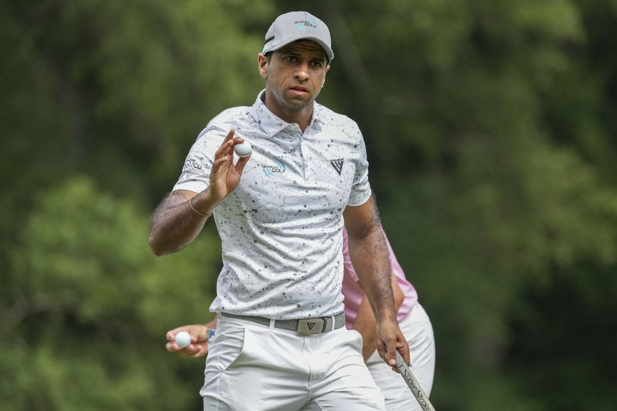 Aug 11, 2024; Greensboro, North Carolina, USA; Aaron Rai acknowledges the gallery during the fourth round of the Wyndham Championship golf tournament at Sedgefield Country Club. Mandatory Credit: Jim Dedmon-USA TODAY Sports