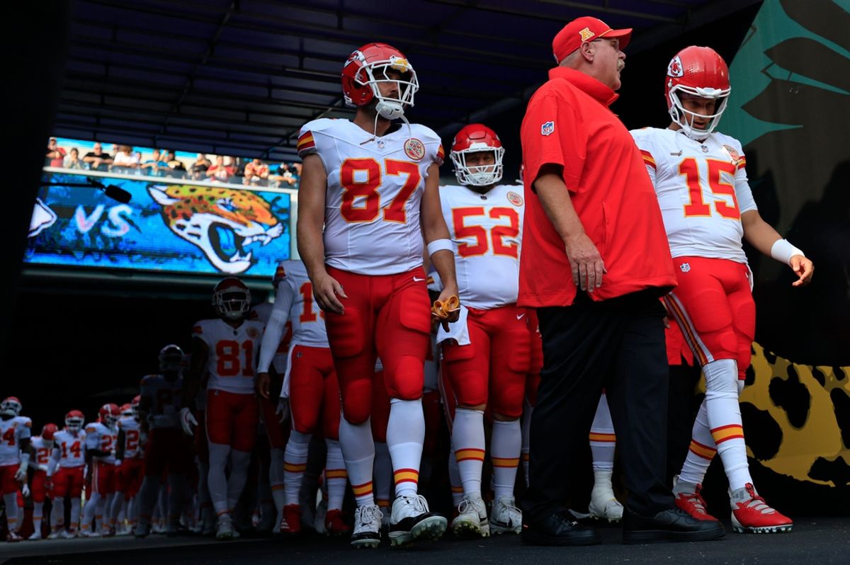 Kansas City Chiefs head coach Andy Reid, center, talks to quarterback Patrick Mahomes (15) next to tight end Travis Kelce (87) before a preseason NFL football game Saturday, Aug. 10, 2024 at EverBank Stadium in Jacksonville, Fla. The Jacksonville Jaguars defeated the Kansas City Chiefs 26-13. [Corey Perrine/Florida Times-Union]