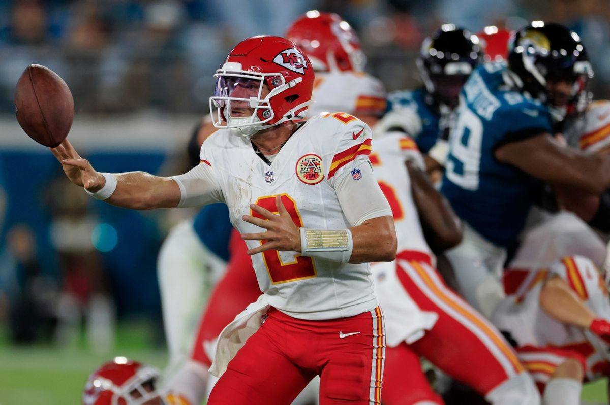Kansas City Chiefs quarterback Ian Book (2) hits a shovel pass during the fourth quarter of a preseason NFL football game Saturday, Aug. 10, 2024 at EverBank Stadium in Jacksonville, Fla. The Jacksonville Jaguars defeated the Kansas City Chiefs 26-13. [Corey Perrine/Florida Times-Union]