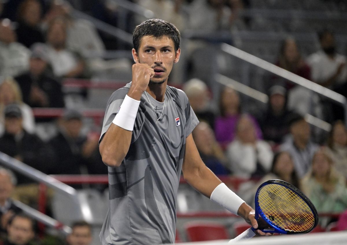 Aug 11, 2024; Montreal, Quebec, Canada; Alexei Popyrin (AUS) reacts after a point against Sebastian Korda (USA) in semifinal play at IGA Stadium. Mandatory Credit: Eric Bolte-USA TODAY Sports