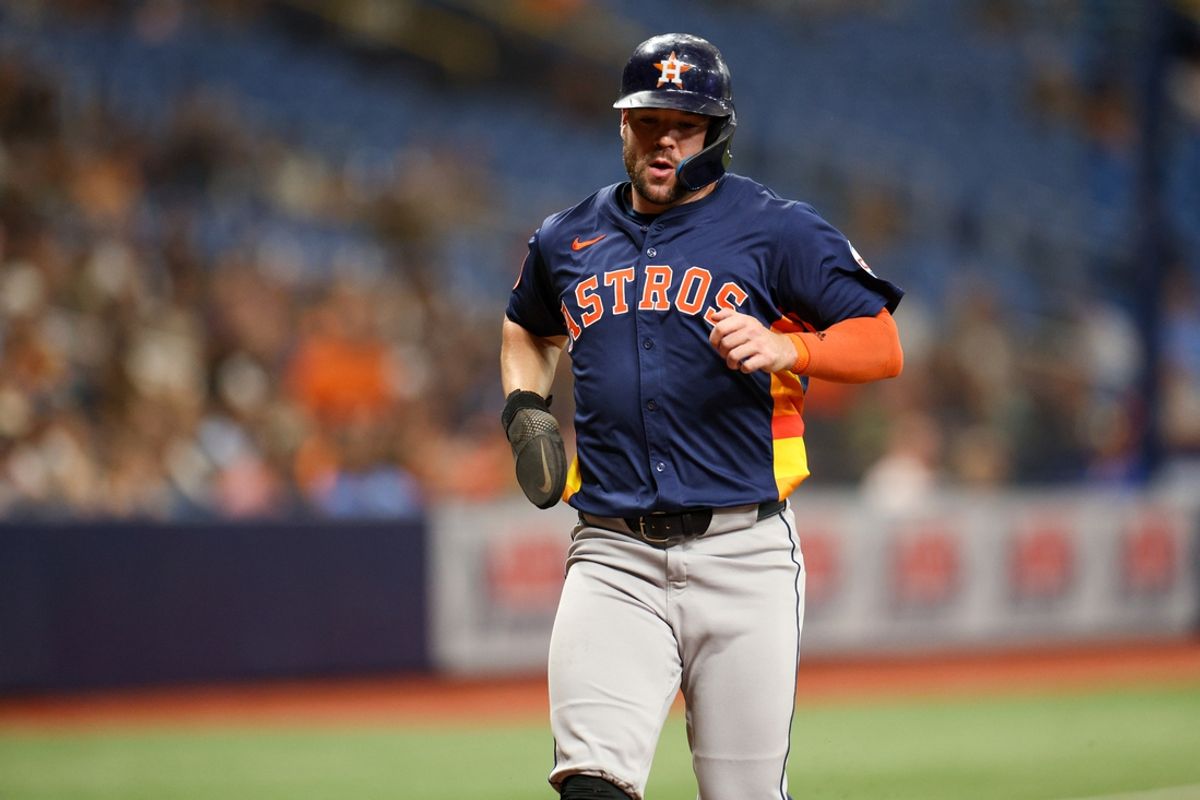 Aug 12, 2024; St. Petersburg, Florida, USA; Houston Astros outfielder Chas McCormick (20) scores a run against the Tampa Bay Rays in the third inning at Tropicana Field. Mandatory Credit: Nathan Ray Seebeck-USA TODAY Sports