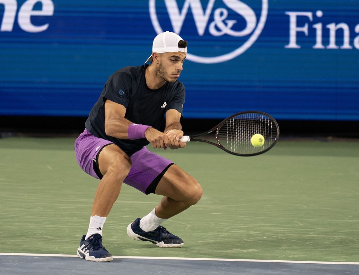 Aug 12, 2024; Cincinnati, OH, USA; Francisco Cerundolo of Argentina returns a shot during his match against Karen Khachanov  on day one of the Cincinnati Open. Mandatory Credit: Susan Mullane-Imagn Images