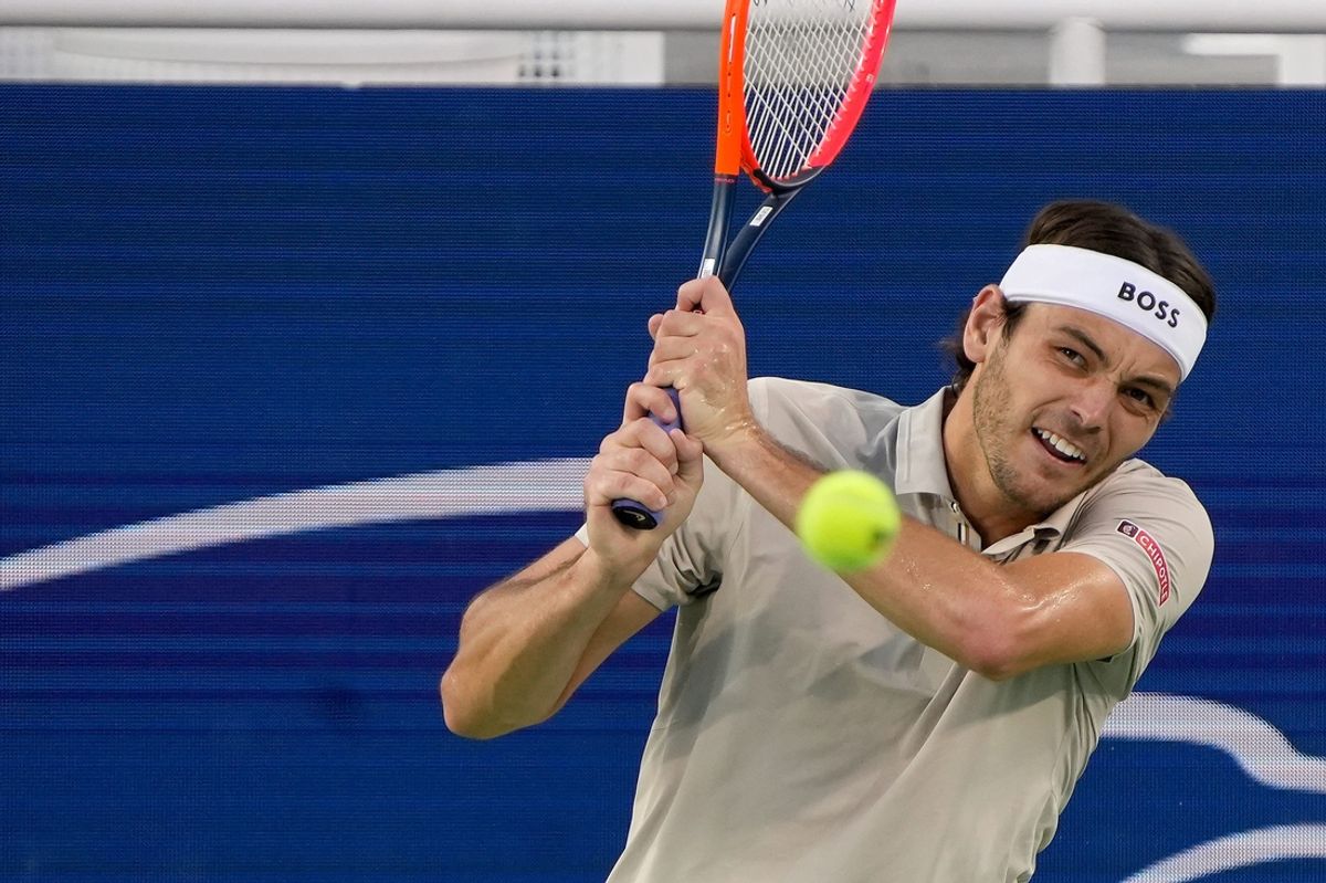 Taylor Fritz returns a serve from Ben Nakashima in the men's singles round 1 during the Cincinnati Open at the Lindner Family Tennis Center in Mason Tuesday, August 13, 2024.