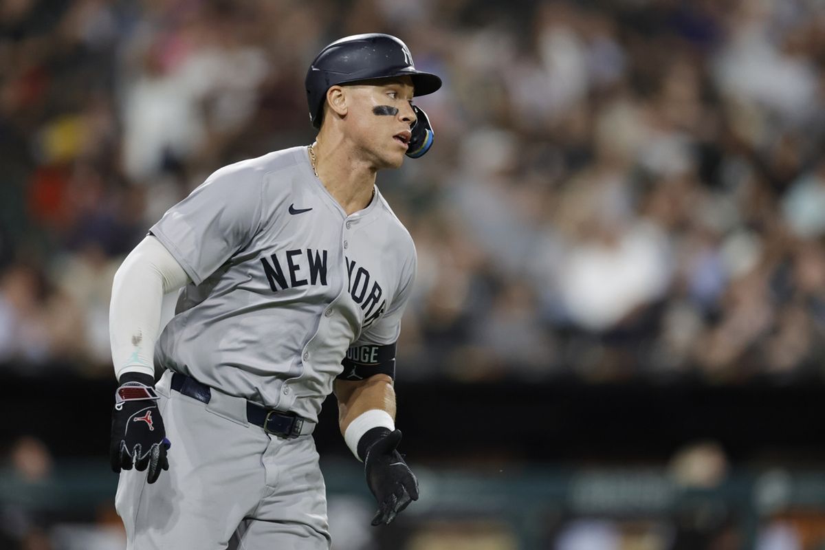 Aug 13, 2024; Chicago, Illinois, USA; New York Yankees outfielder Aaron Judge (99) runs after hitting a single against the Chicago White Sox during the seventh inning at Guaranteed Rate Field. Mandatory Credit: Kamil Krzaczynski-USA TODAY Sports