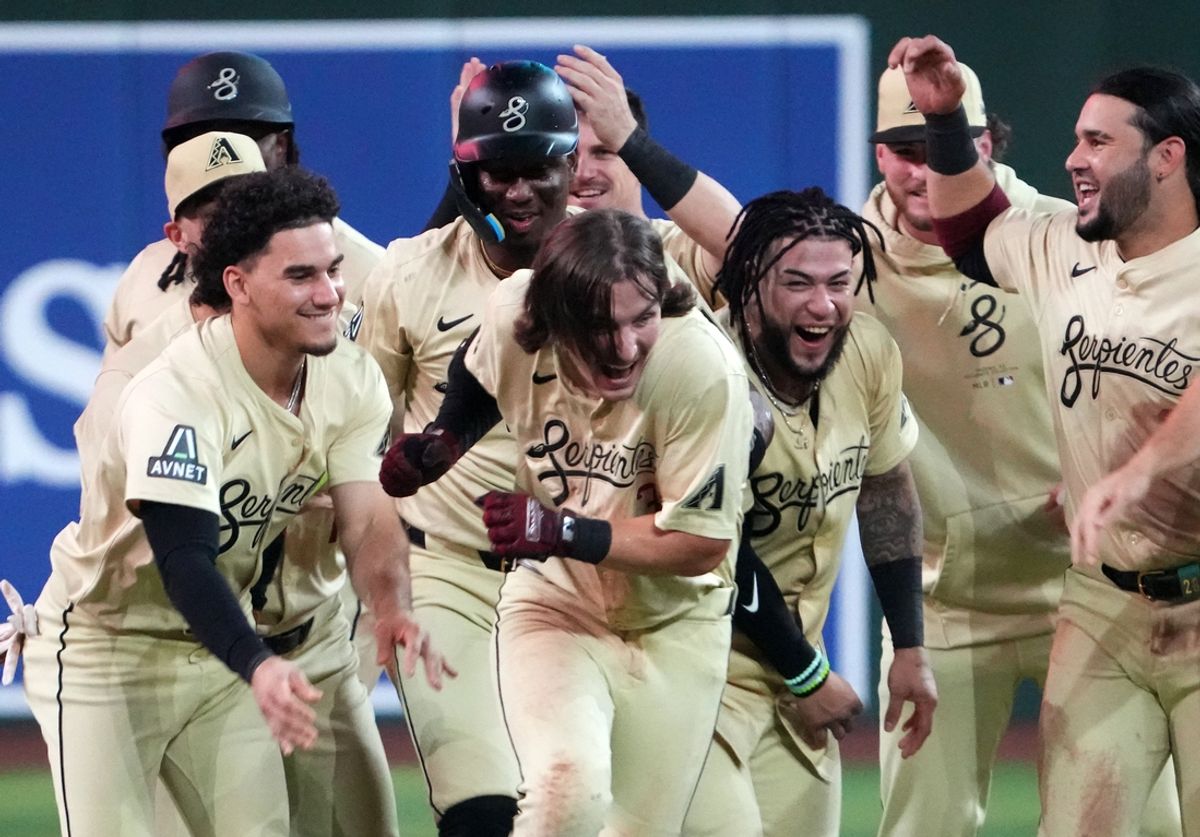 Aug 13, 2024; Phoenix, Arizona, USA; Arizona Diamondbacks outfielder Jake McCarthy (31) celebrates with teammates after hitting a two RBI walk off single against the Colorado Rockies during the ninth inning at Chase Field. Mandatory Credit: Joe Camporeale-USA TODAY Sports