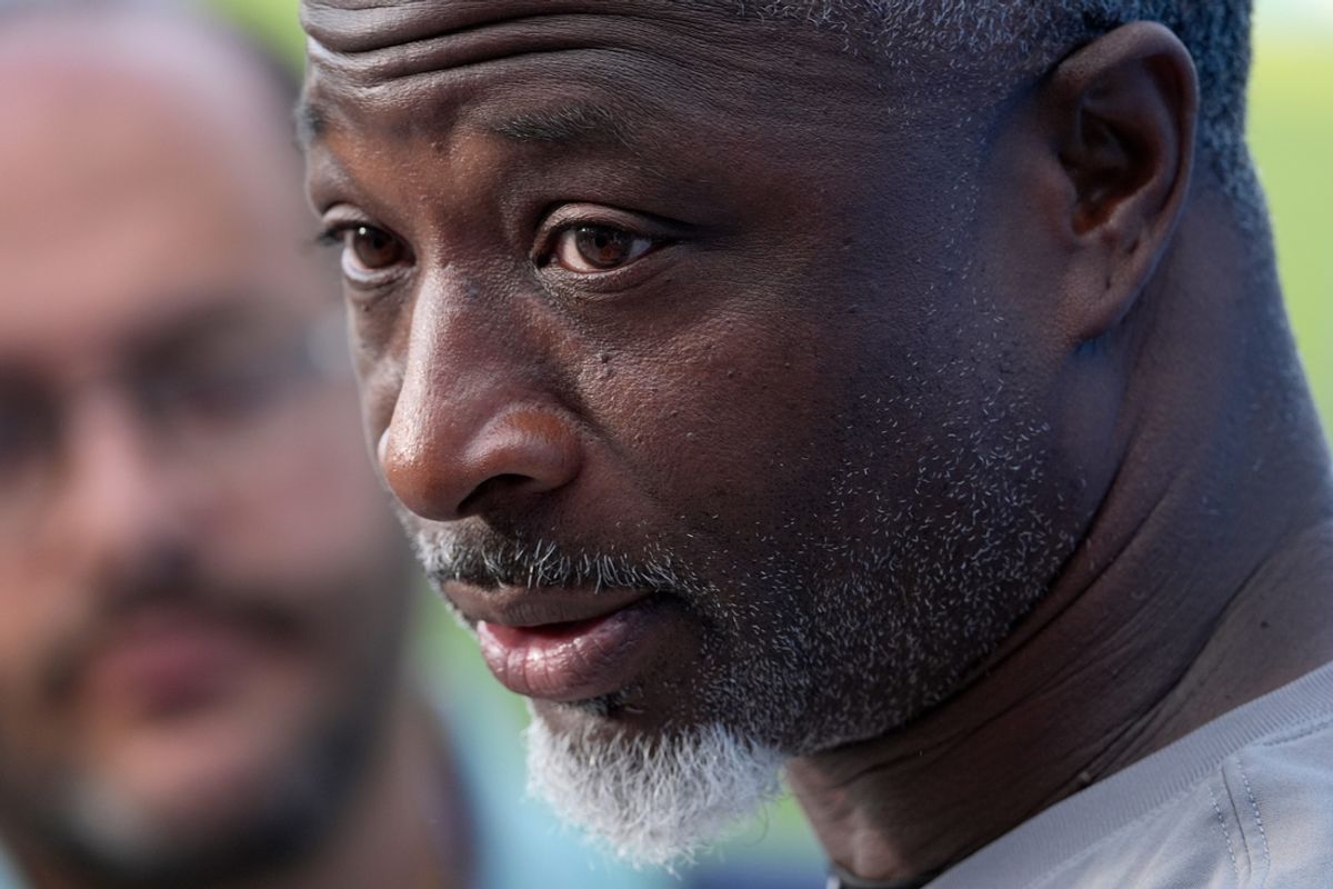 Detroit Lions defensive coordinator Aaron Glenn talks with the media before practice at the Detroit Lions training facility in Allen Park on Wednesday, August 14, 2024.